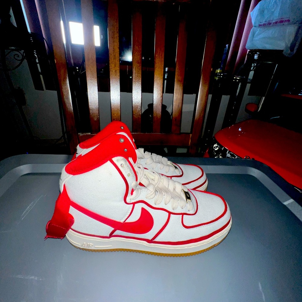 Cream white and red Nikes